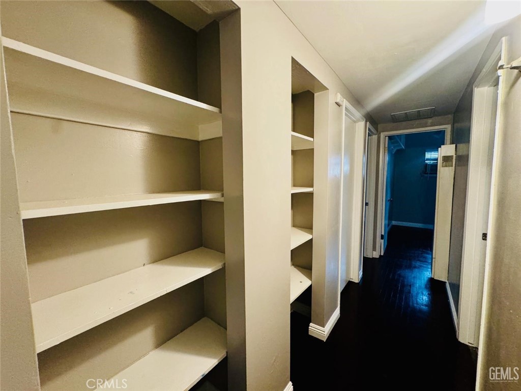 9 Dunlap Street Bakersfield, CA 93309 - Photo 15 of 22 a hallway with closet