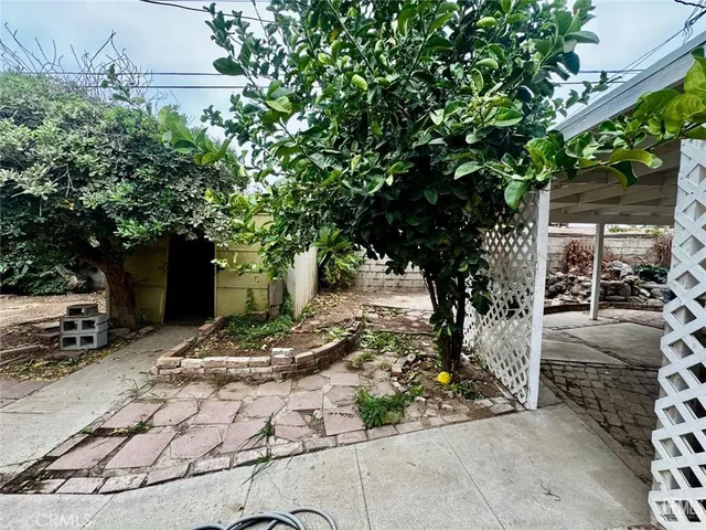 a view of a backyard of the house