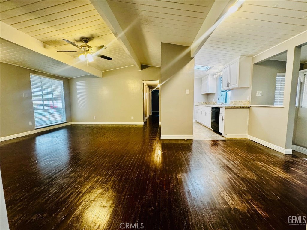 9 Dunlap Street Bakersfield, CA 93309 - Photo 8 of 22 a view of a room with wooden floors