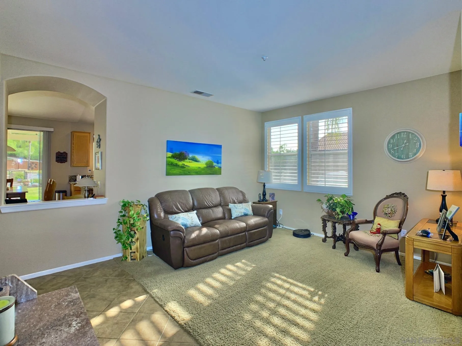 17272 Prairie Mile Road Ramona, CA 92065 - Photo 17 of 51 a living room with furniture and a potted plant