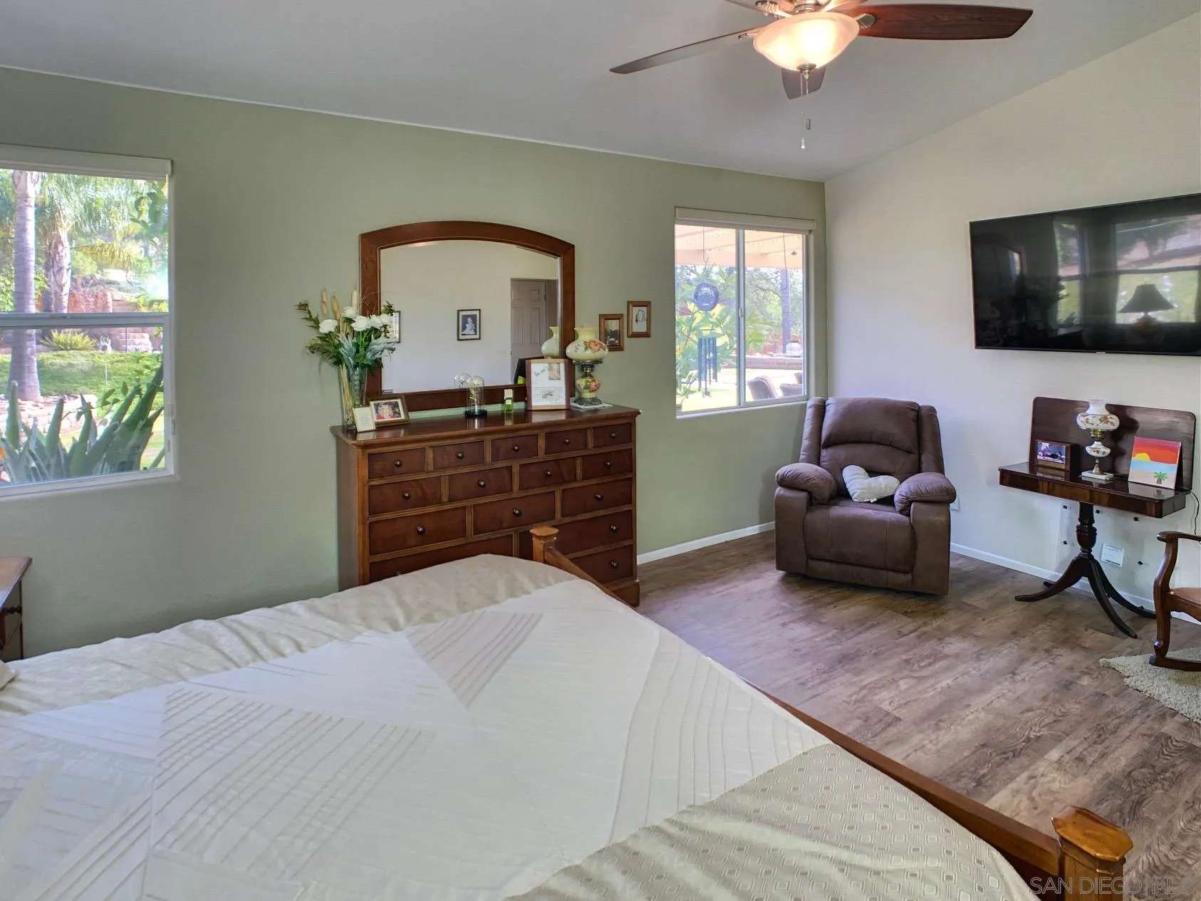 17272 Prairie Mile Road Ramona, CA 92065 - Photo 25 of 51 a bedroom with a bed and a flat screen tv