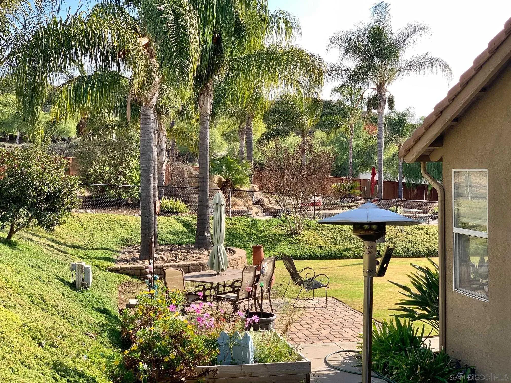 17272 Prairie Mile Road Ramona, CA 92065 - Photo 45 of 51 a view of swimming pool with a patio and garden