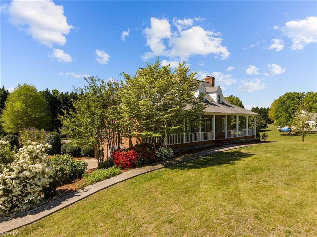130 Deer Path Summerfield, NC 27358 - Photo 12 of 50 Another angle of the front view.