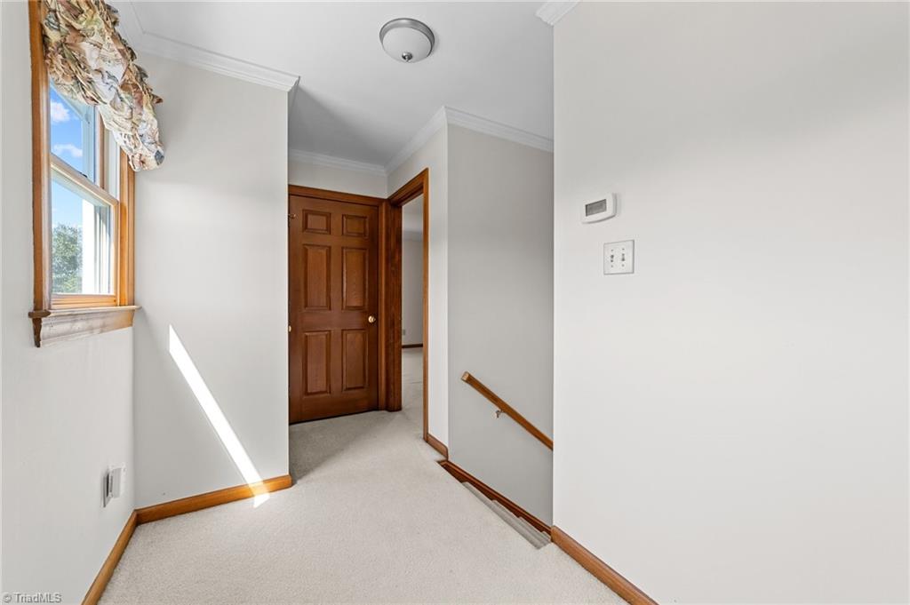 130 Deer Path Summerfield, NC 27358 - Photo 22 of 50 Hallway on the second floor.