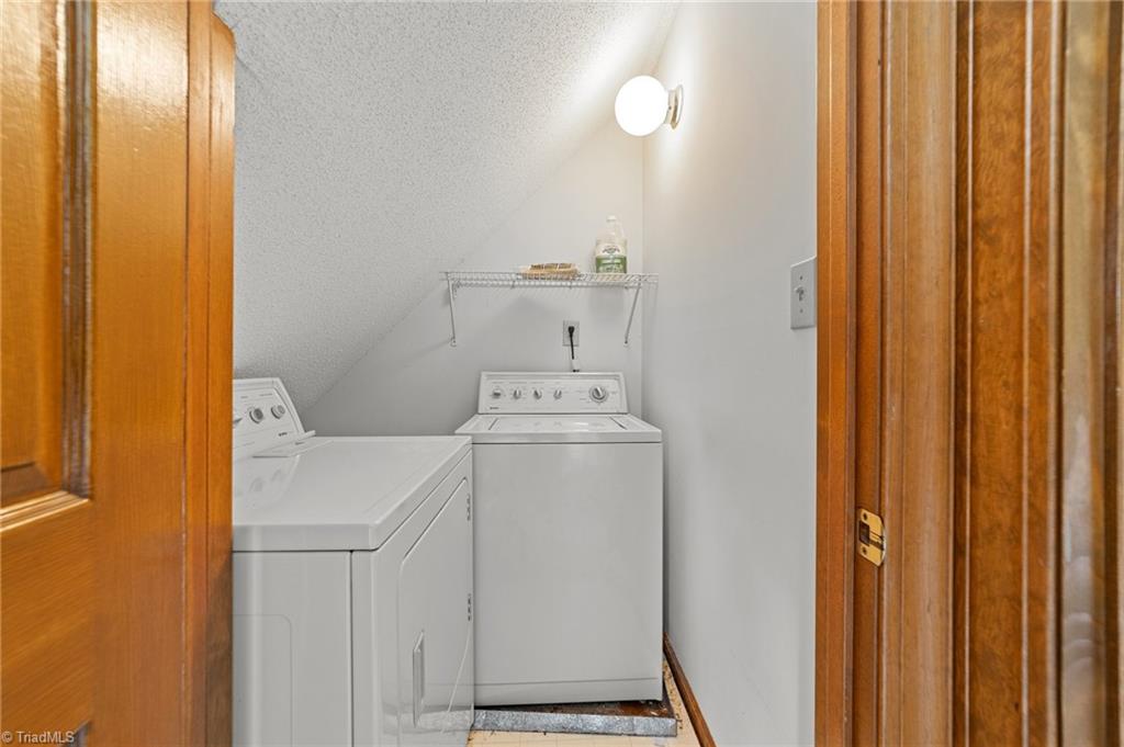 130 Deer Path Summerfield, NC 27358 - Photo 23 of 50 Laundry on the second floor located end of the hallway.
