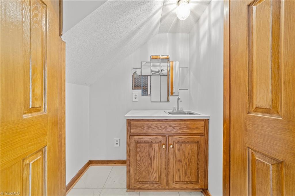 130 Deer Path Summerfield, NC 27358 - Photo 34 of 50 Half bathroom.