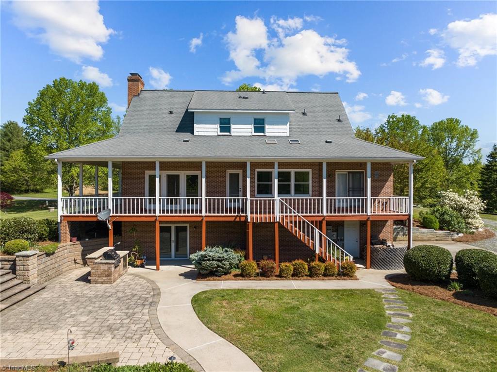 130 Deer Path Summerfield, NC 27358 - Photo 36 of 50 Back exterior of the home.