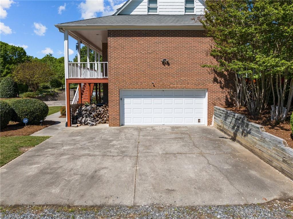 130 Deer Path Summerfield, NC 27358 - Photo 38 of 50 2 car attached garage in the basement.