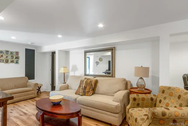 a living room with furniture and a table