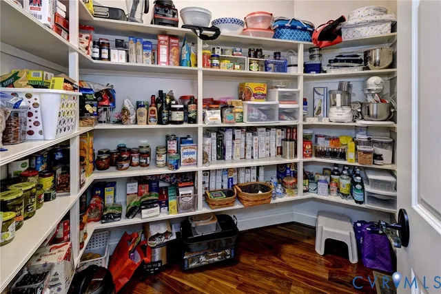 a workspace with furniture window and a ceiling fan