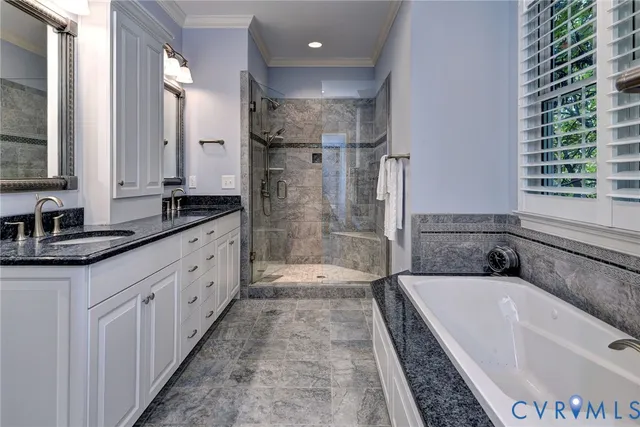 a utility room with sink dryer and washer