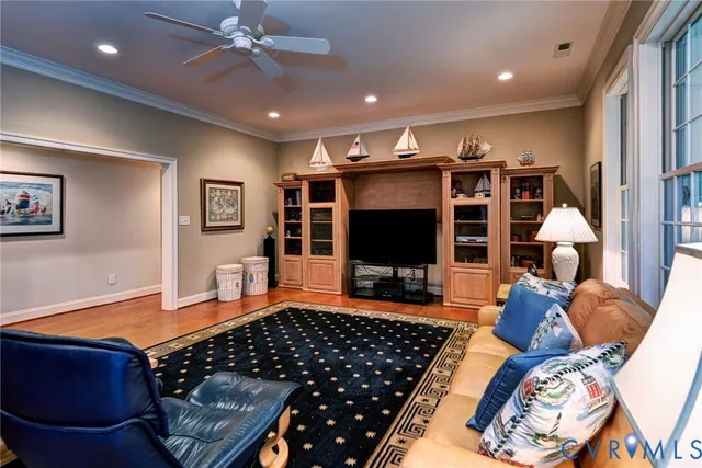a bedroom with double bed and a large window