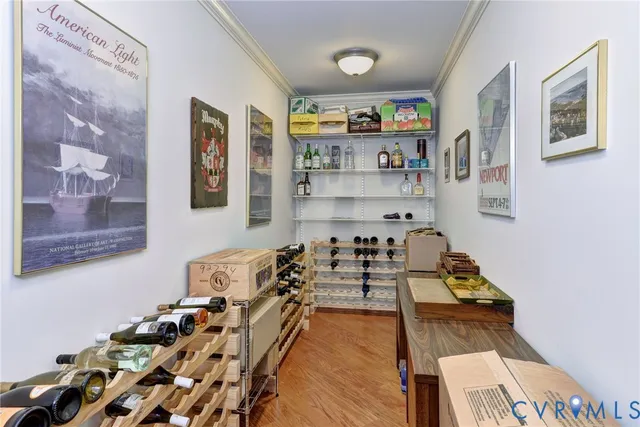 a bed room with a bed and a chandelier