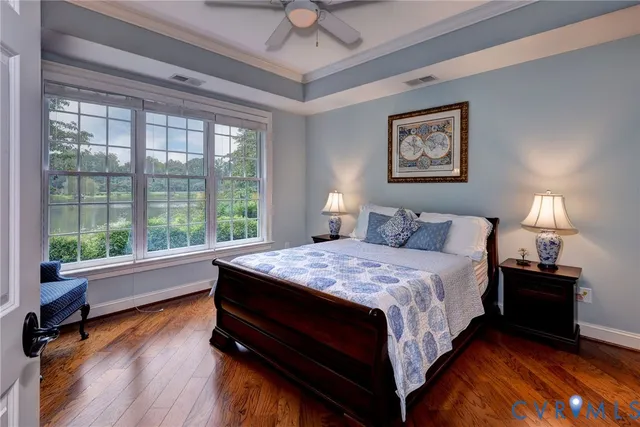 a bed room with a bed and a window