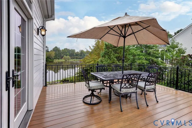 a view of a balcony with wooden floor