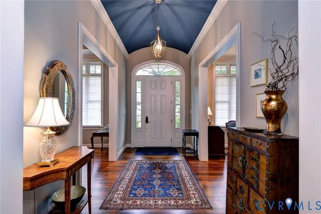 a view of a dining room with furniture and window