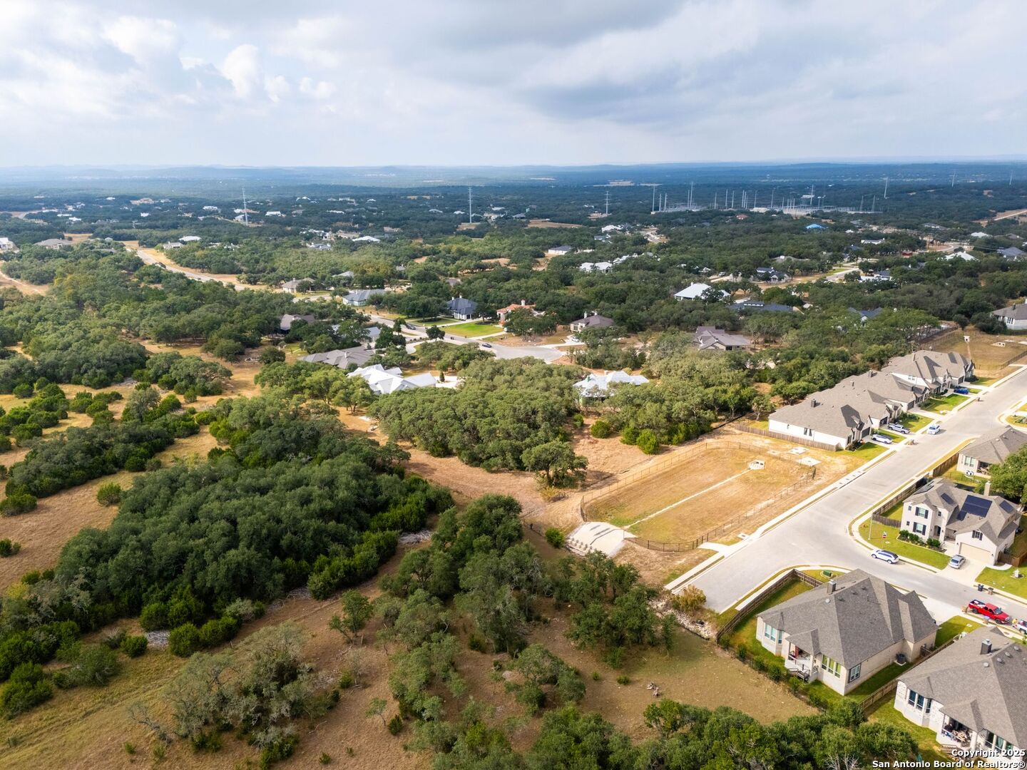 34858 Last Stage Way Bulverde, TX 78163 - Photo 12 of 16 an aerial view of residential houses with outdoor space