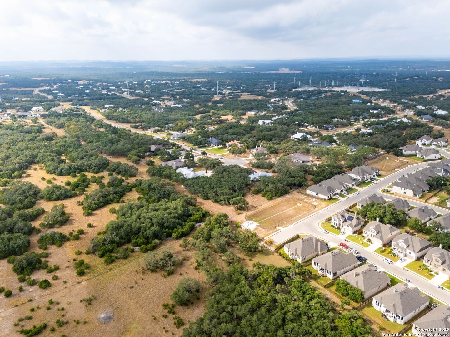 34858 Last Stage Way Bulverde, TX 78163 - Photo 13 of 16 an aerial view of residential houses with city view