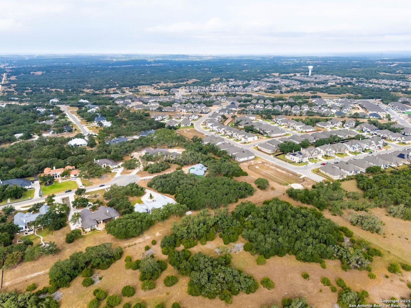 34858 Last Stage Way Bulverde, TX 78163 - Photo 14 of 16 an aerial view of residential building and trees around