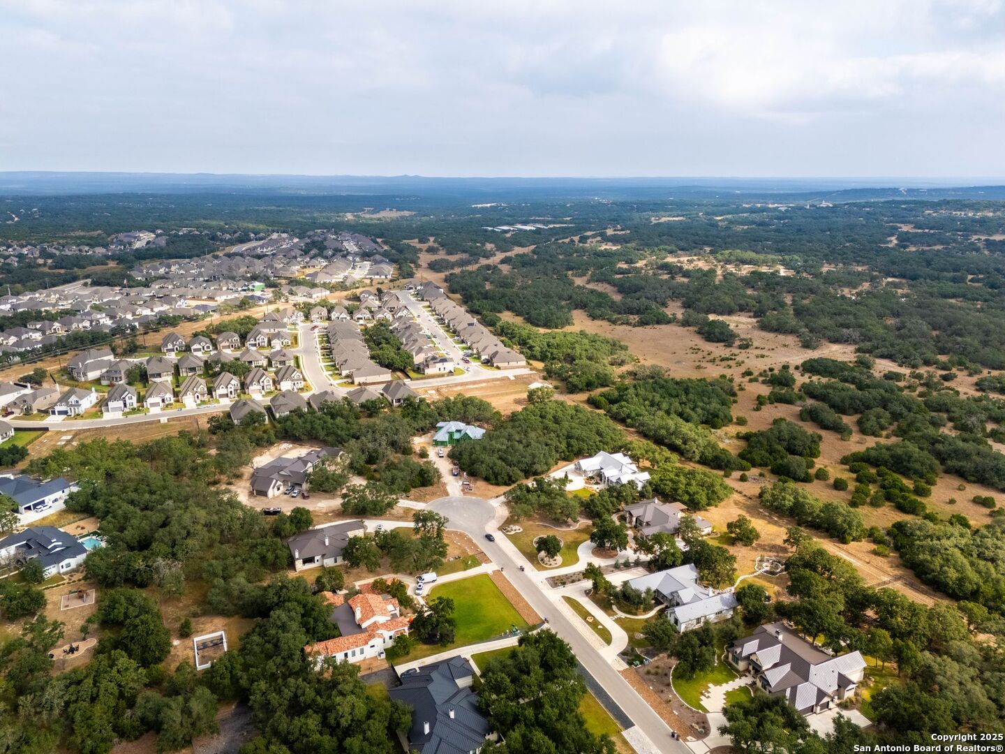 34858 Last Stage Way Bulverde, TX 78163 - Photo 5 of 16 an aerial view of residential building with parking space