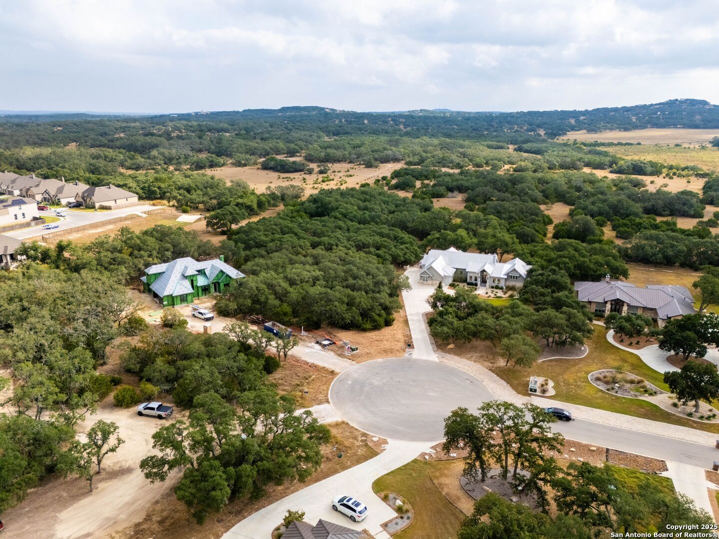 34858 Last Stage Way Bulverde, TX 78163 - Photo 8 of 16 an aerial view of residential houses with outdoor space