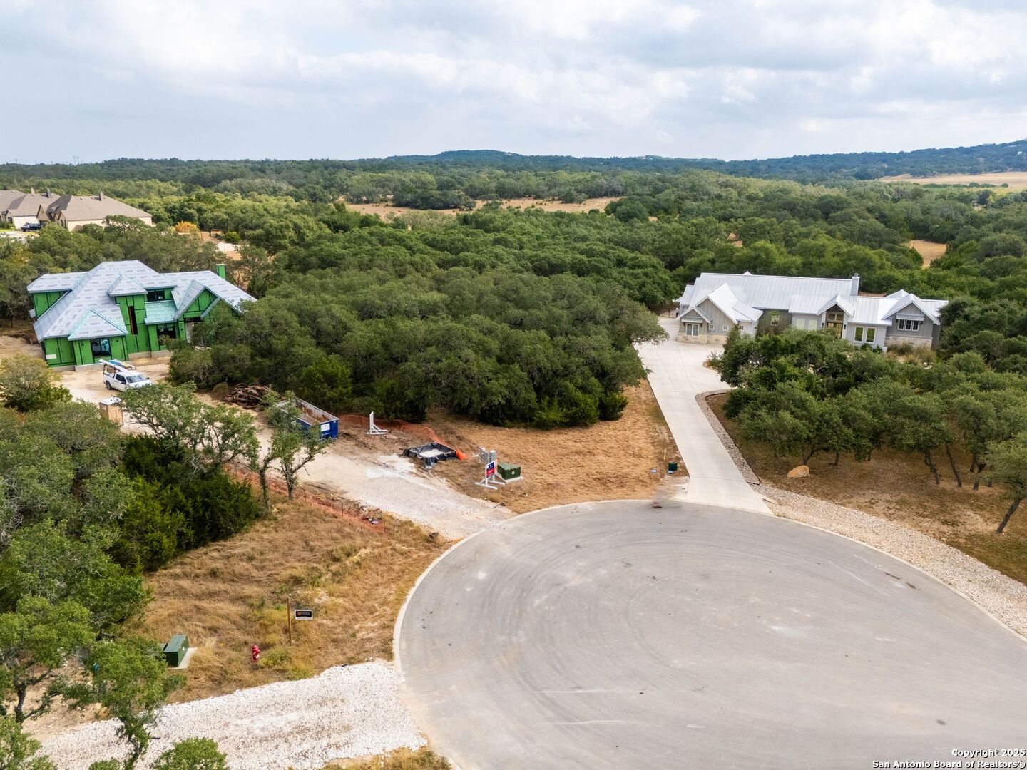 34858 Last Stage Way Bulverde, TX 78163 - Photo 9 of 16 an aerial view of residential houses with outdoor space