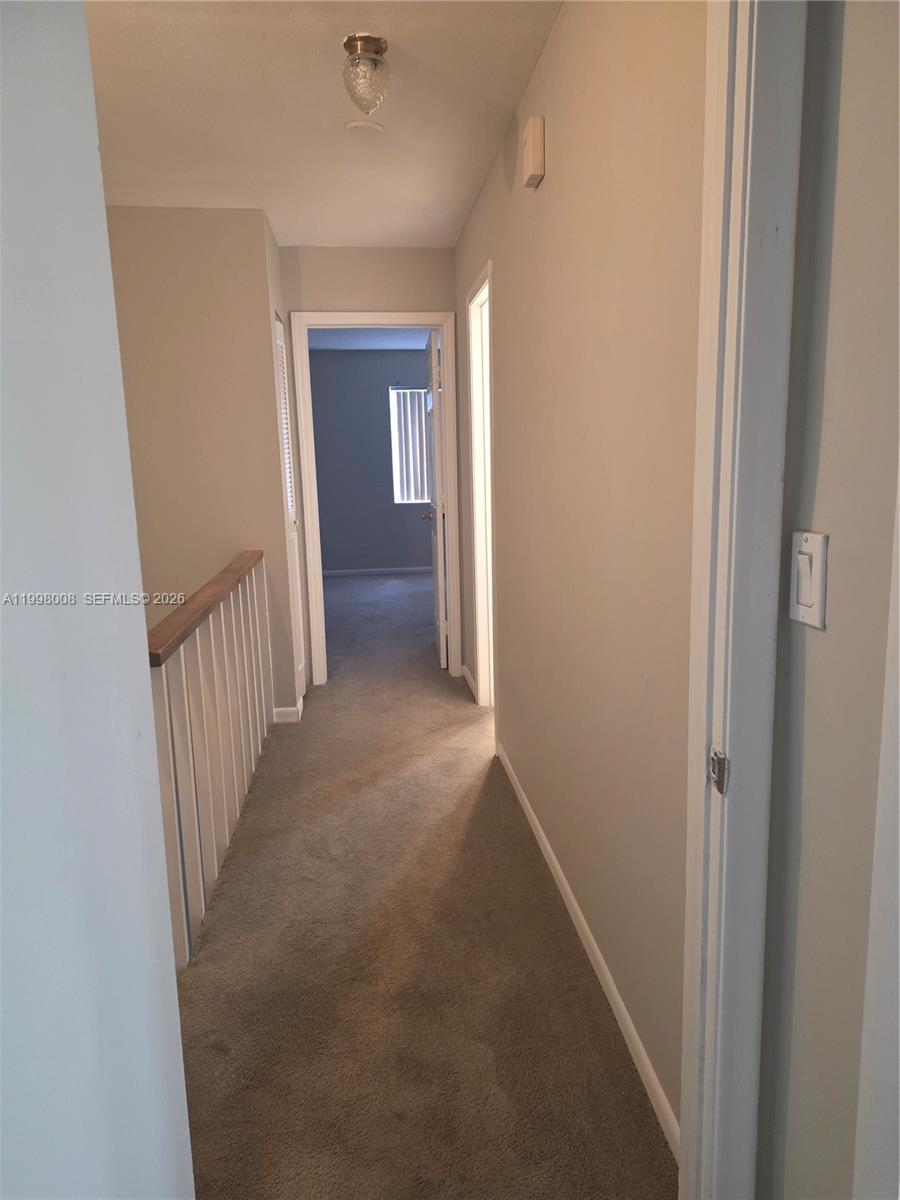 9500 Southwest 3rd Street, Unit 259 Boca Raton, FL 33428 - Photo 6 of 10 a view of a hallway with entryway