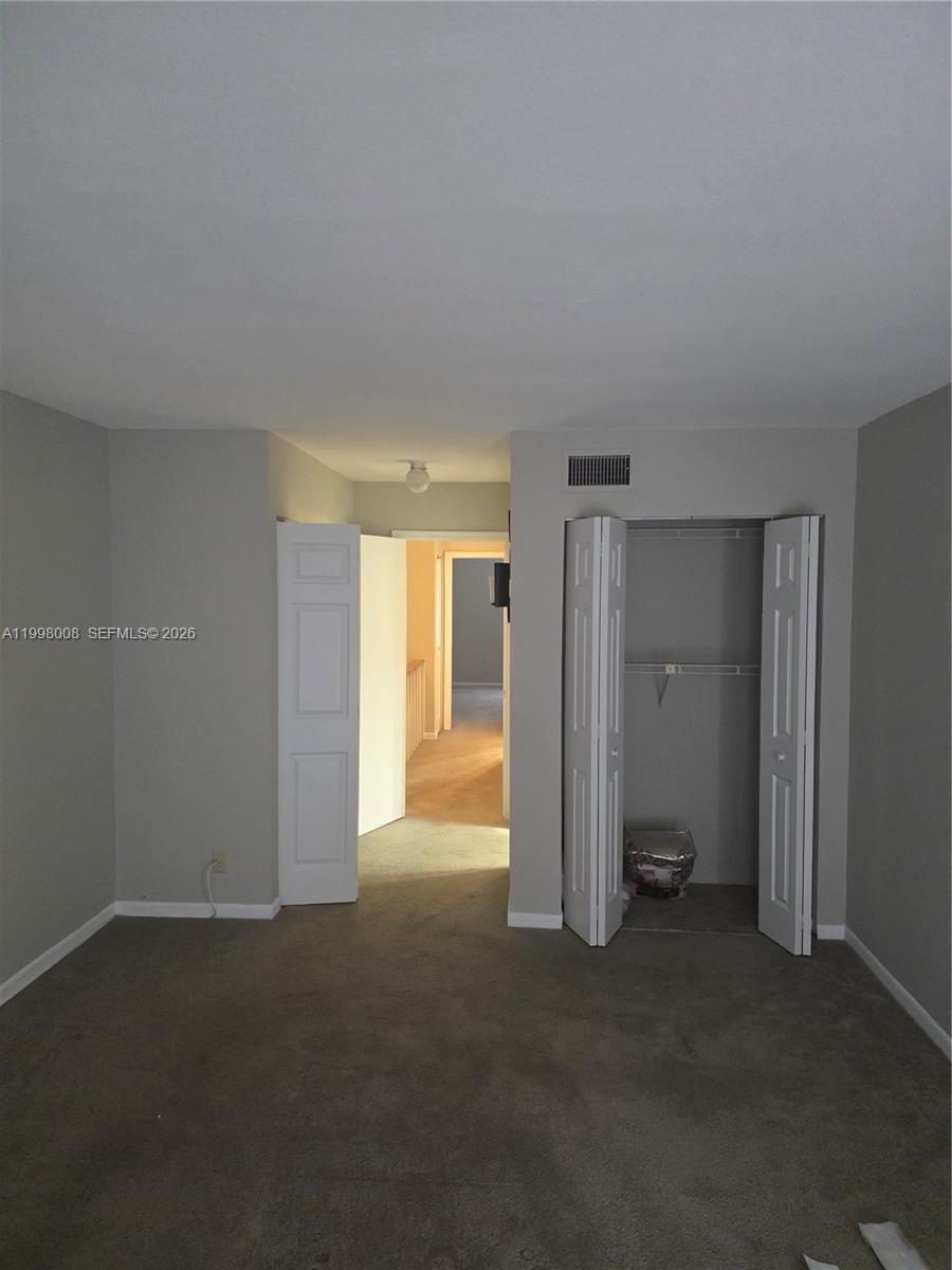 9500 Southwest 3rd Street, Unit 259 Boca Raton, FL 33428 - Photo 7 of 10 a view of an empty room
