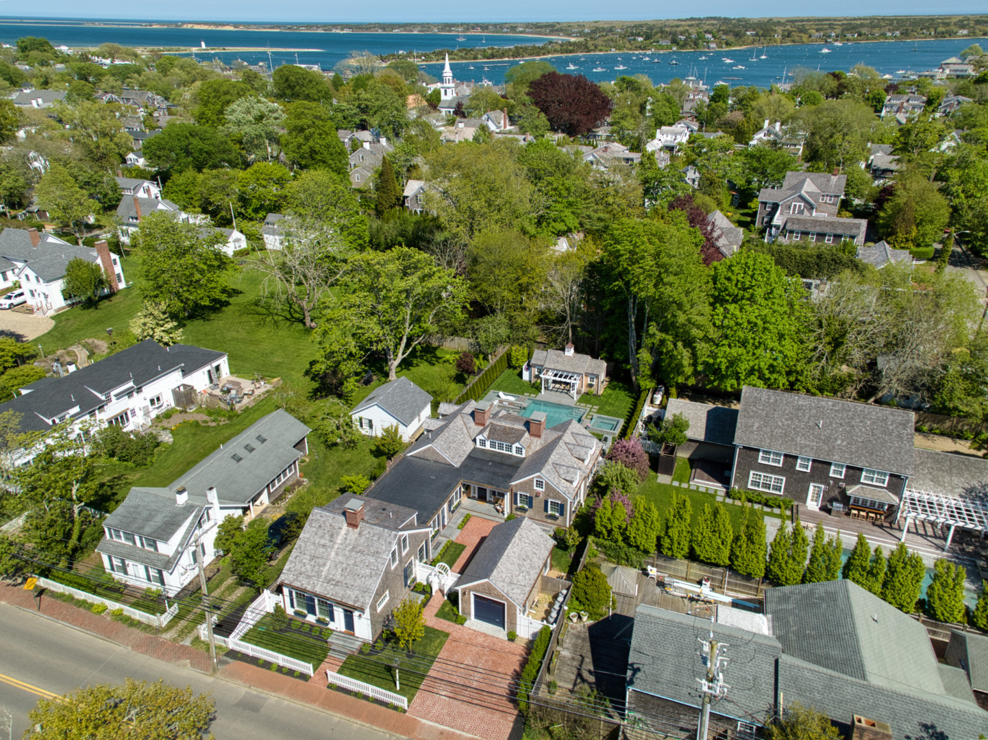 an aerial view of residential houses with outdoor space