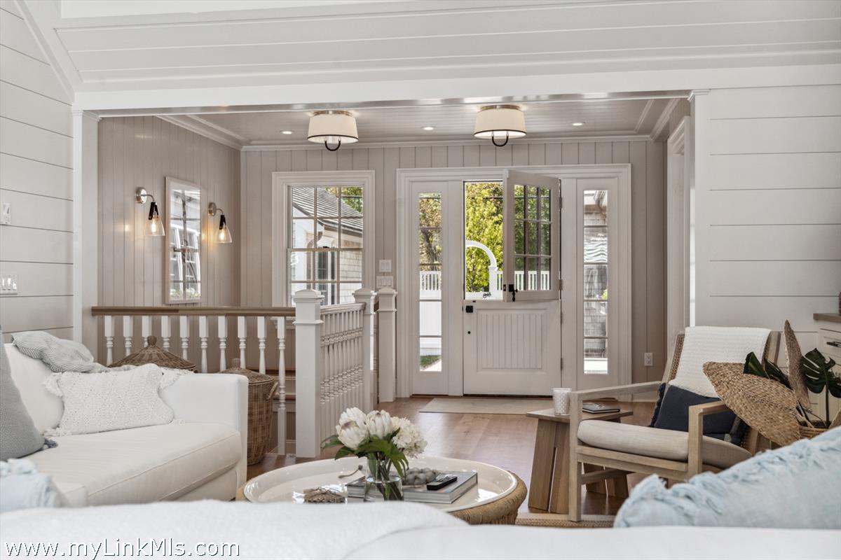 43 Peases Point Way South Edgartown, MA 02539 - Photo 21 of 52 a living room with furniture and wooden floor