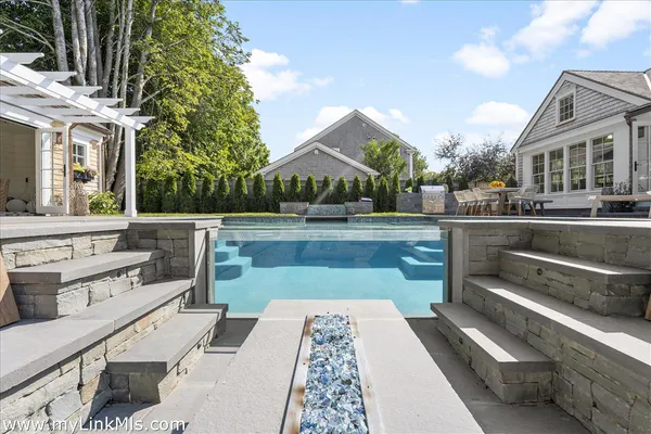 a view of a house with a swimming pool