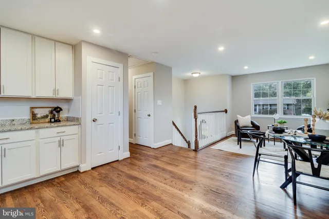 a view of a livingroom with furniture and a window