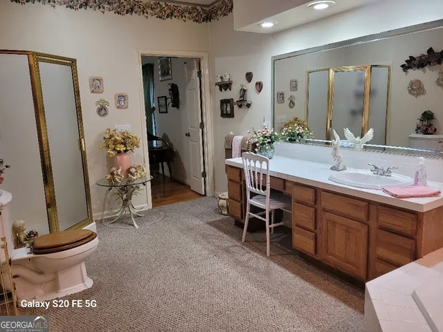 a bathroom with a sink and mirror