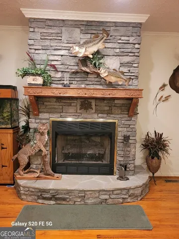 a stove top oven sitting inside of a kitchen