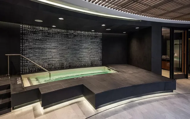 a view of swimming pool with outdoor seating