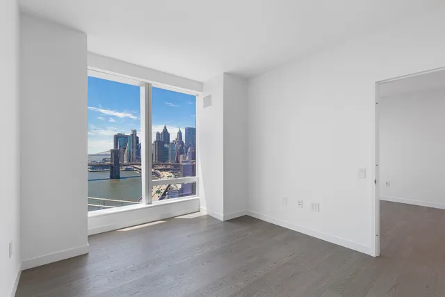 an empty room with windows