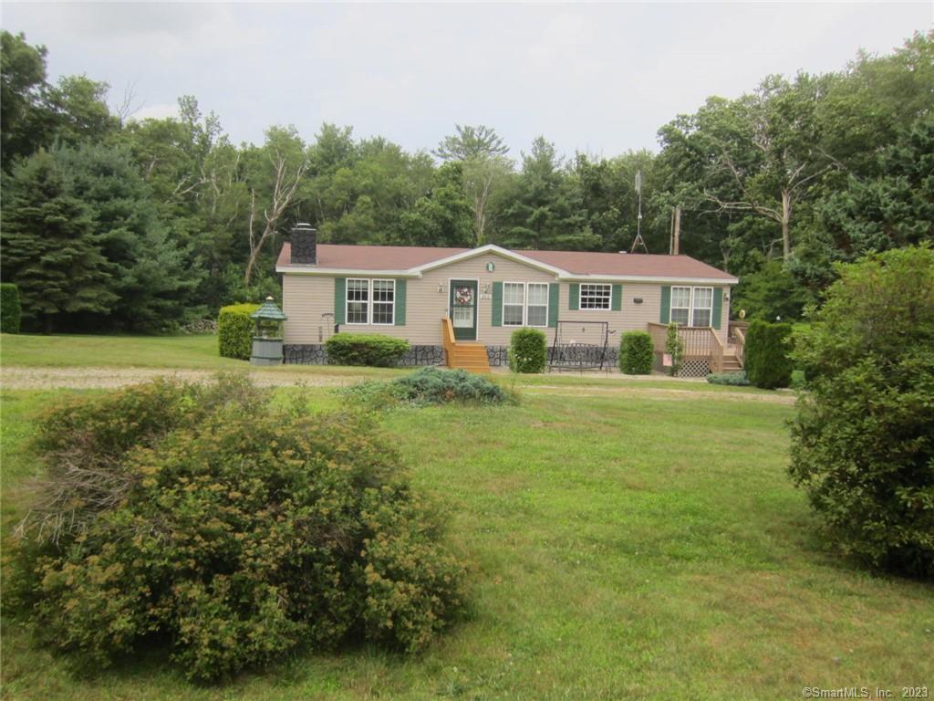 300 Bear Hill Road Killingly, CT 06241 - Photo 1 of 1 a view of a house with a big yard and large trees