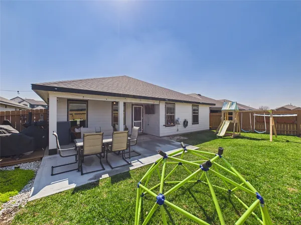 a view of a house with a patio