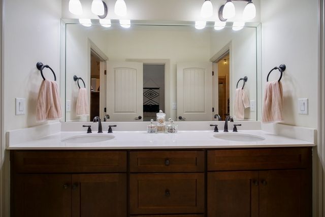 a bedroom with bed and a window