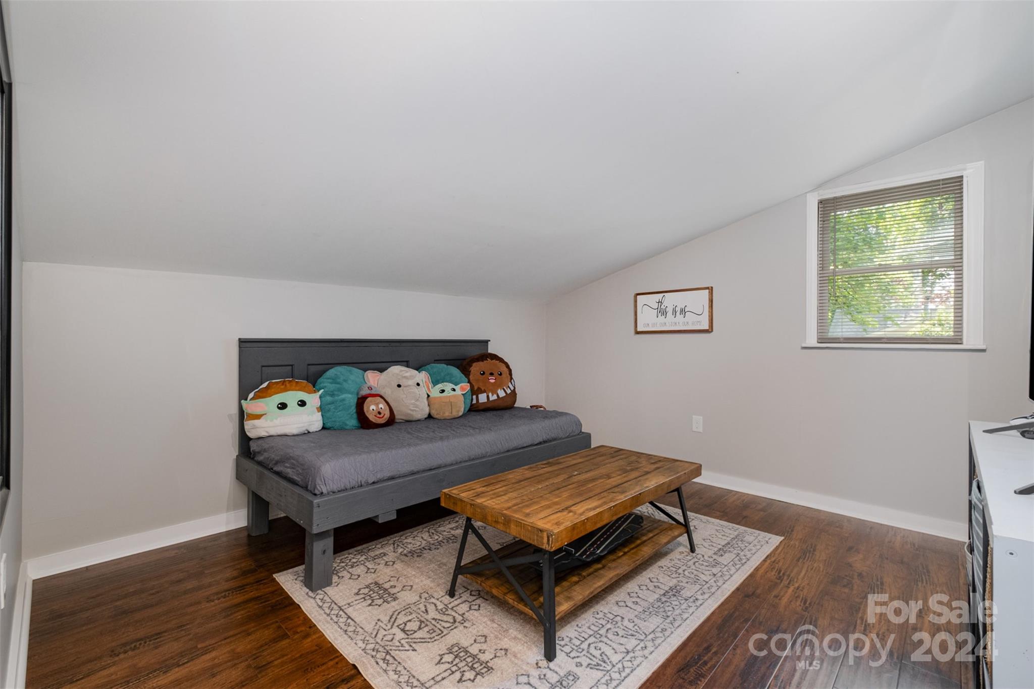 4033 Windward Drive Tega Cay, SC 29708 - Photo 13 of 38 a living room with furniture and a window