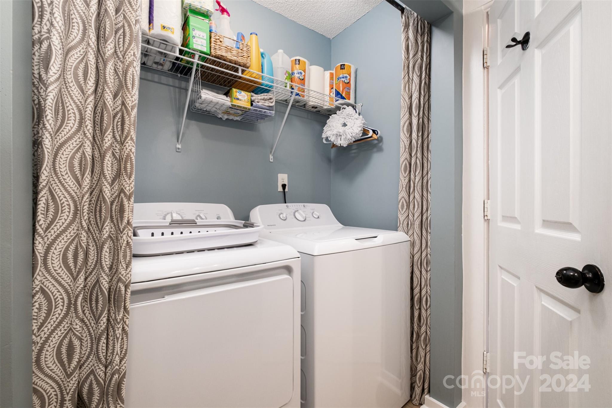 4033 Windward Drive Tega Cay, SC 29708 - Photo 15 of 38 a utility room with dryer and washer