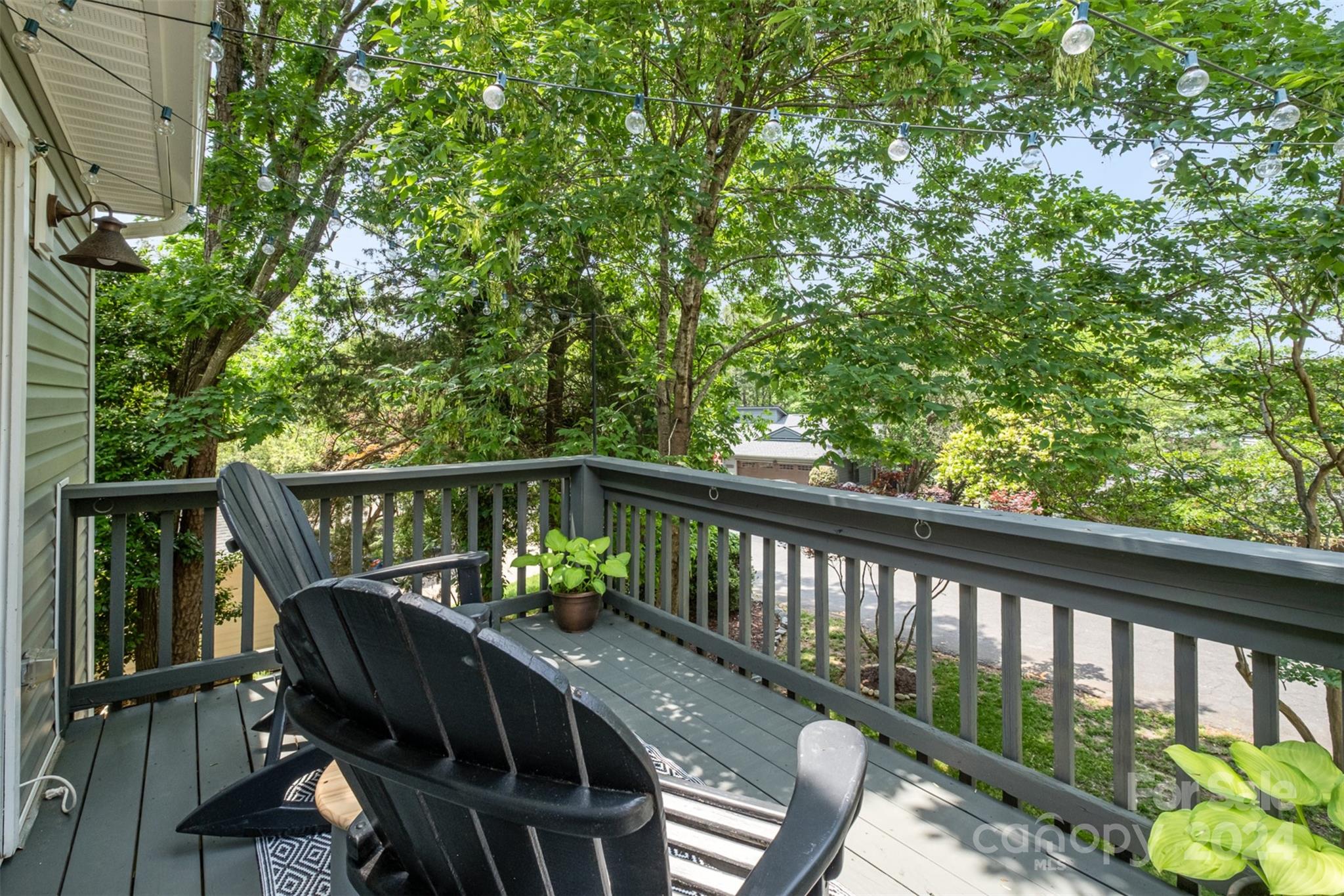 4033 Windward Drive Tega Cay, SC 29708 - Photo 24 of 38 a view of balcony with furniture and trees