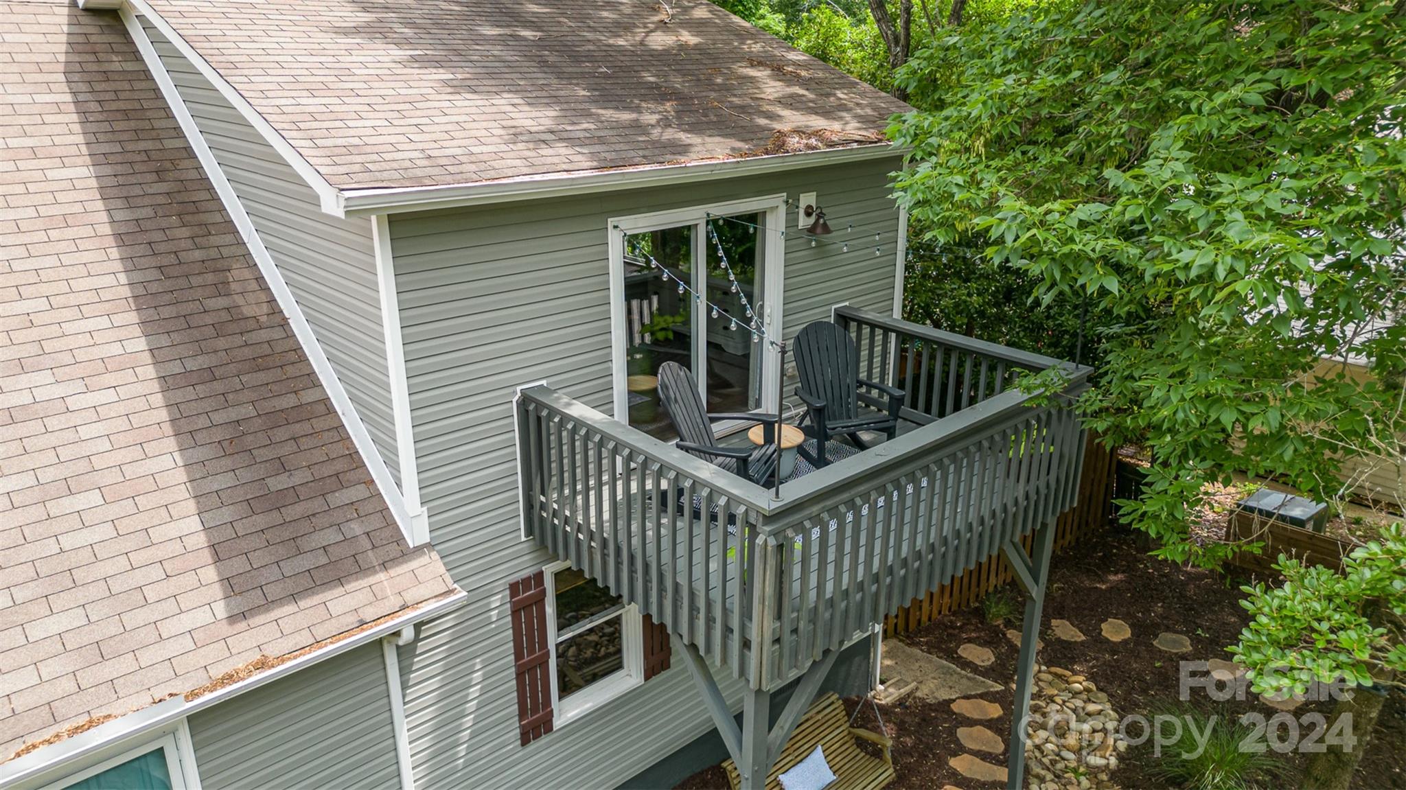 4033 Windward Drive Tega Cay, SC 29708 - Photo 26 of 38 a view of balcony with deck and outdoor seating