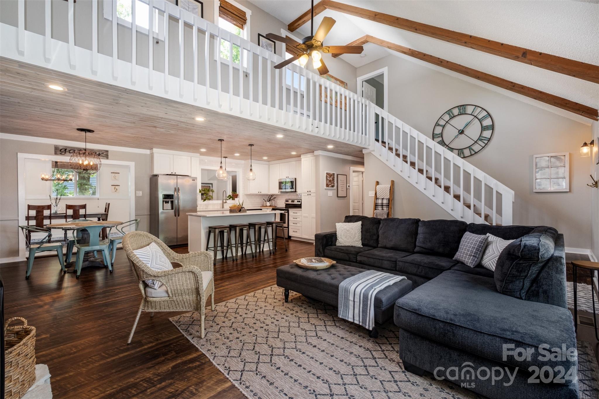 4033 Windward Drive Tega Cay, SC 29708 - Photo 5 of 38 a living room with furniture and a ceiling fan
