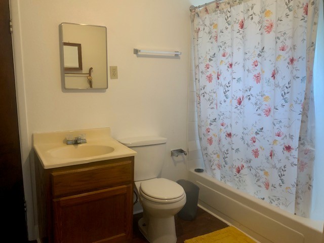 850 Slade Street Coldspring, TX 77331 - Photo 19 of 31 a bathroom with a toilet and a sink