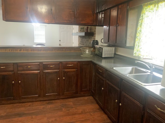 850 Slade Street Coldspring, TX 77331 - Photo 10 of 31 a kitchen with a sink and cabinets