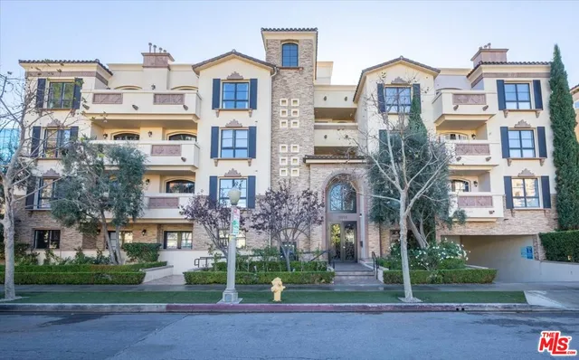 a front view of residential houses with street