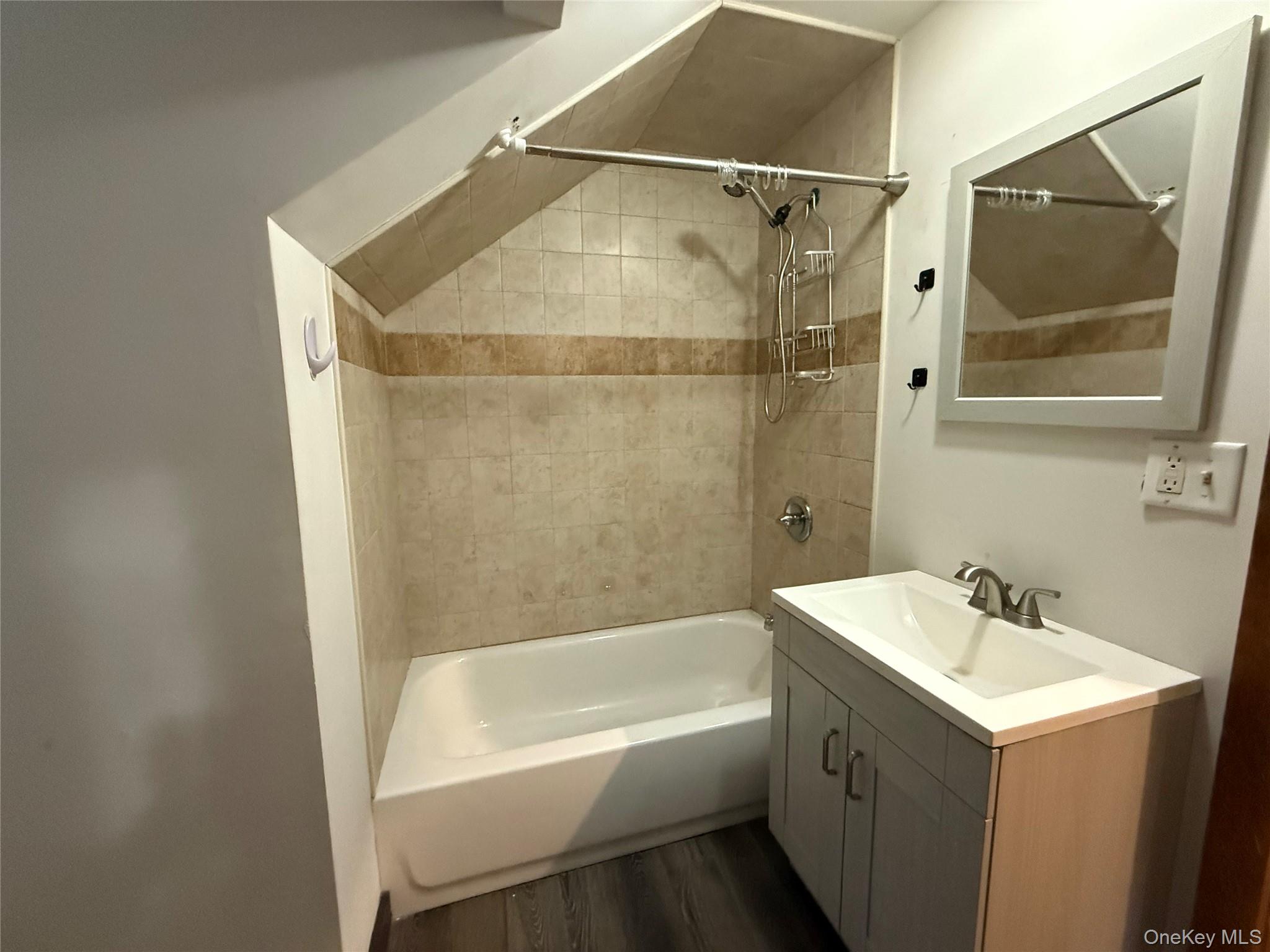 241 White Bridge Road Middletown, NY 10940 - Photo 26 of 29 Bathroom with shower / bath combination, vanity, and dark wood finished floors