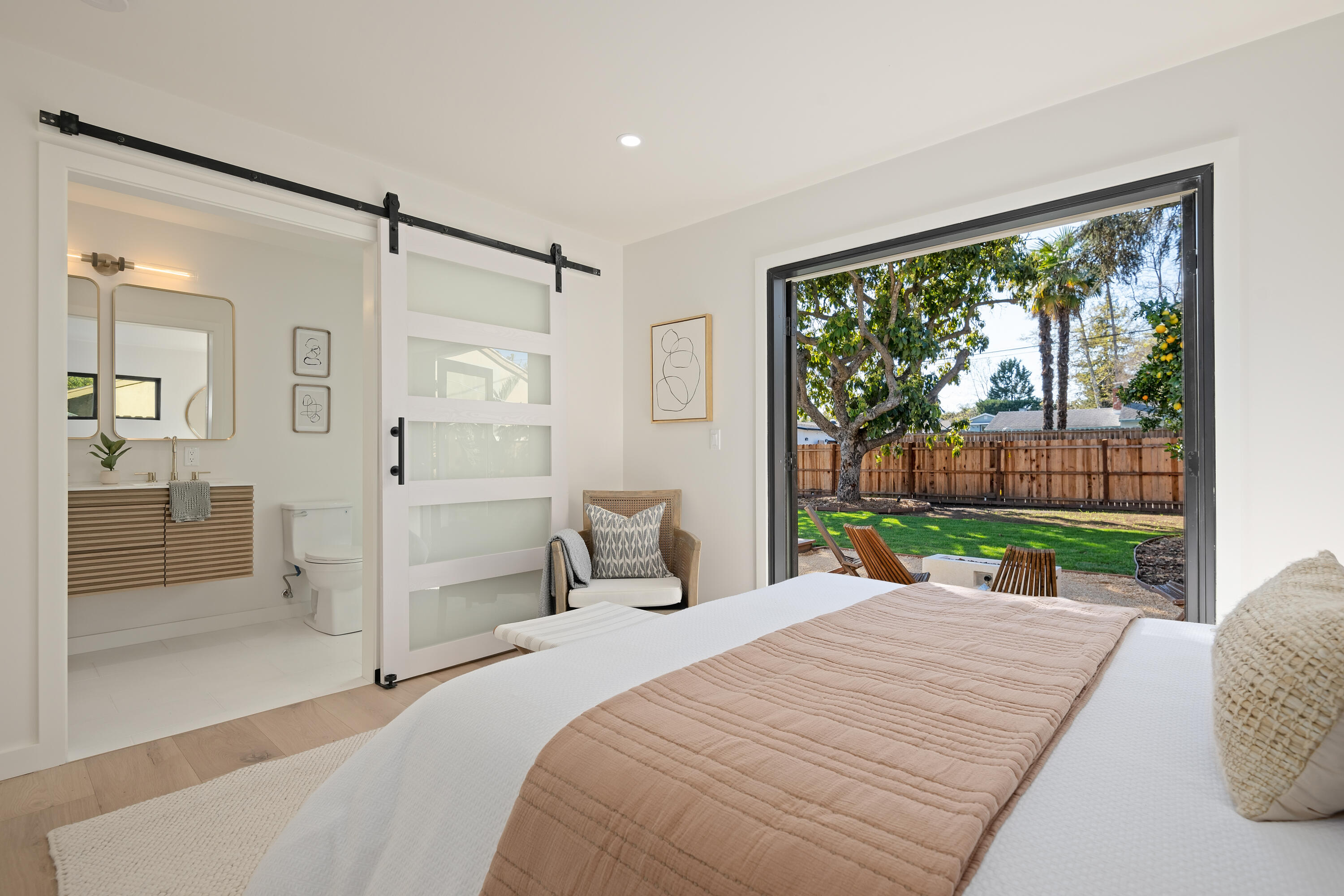 501 Northview Road Santa Barbara, CA 93105 - Photo 12 of 31 a bedroom with a bed and a large window