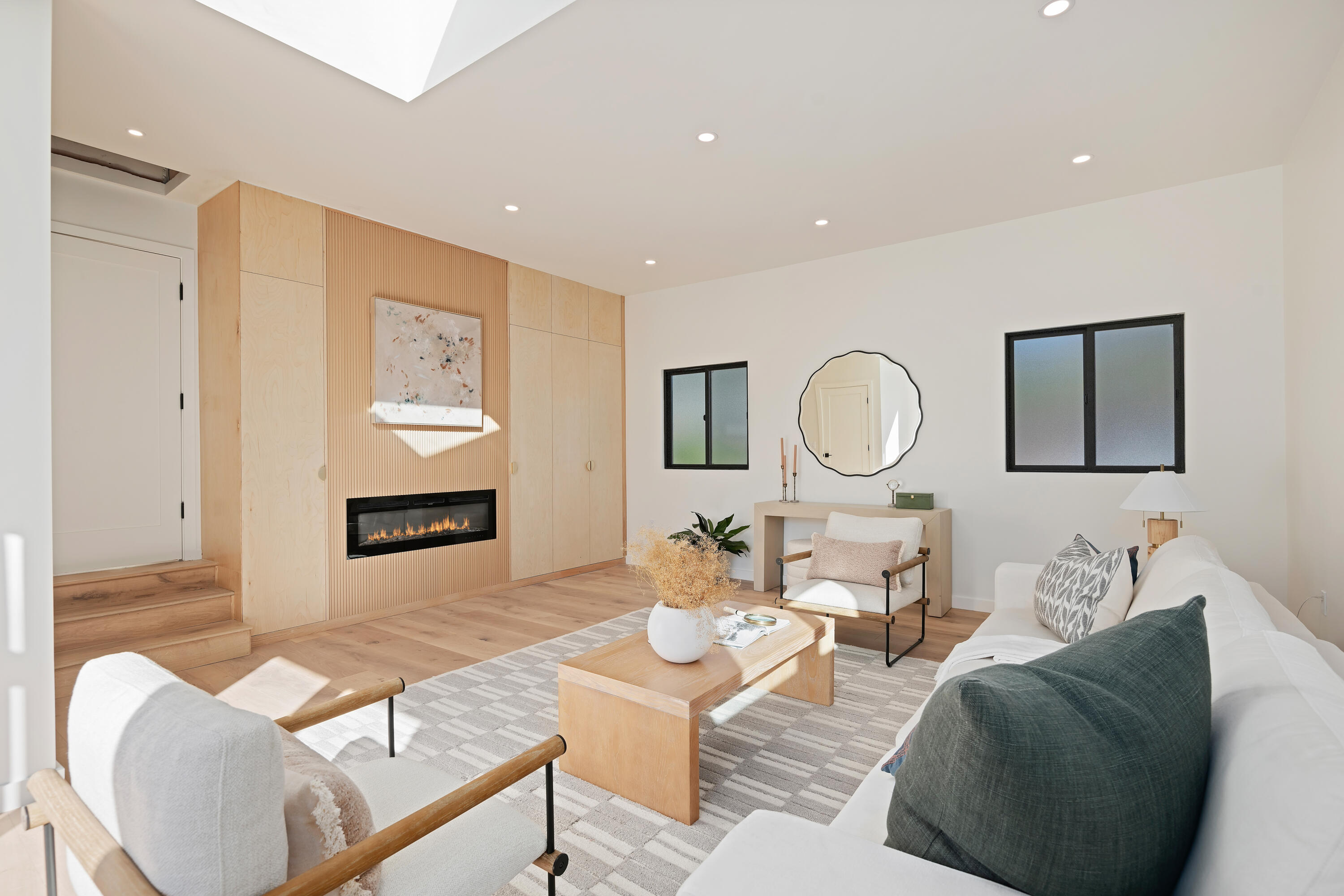 501 Northview Road Santa Barbara, CA 93105 - Photo 17 of 31 a living room with furniture a mirror and wooden floor